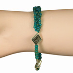  Click to view Celtic Bracelet with blue beads.